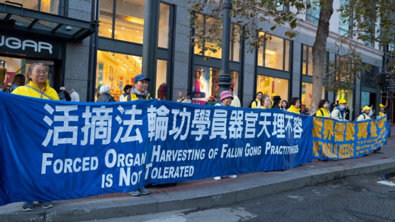 APEC峰會期間 法輪功要求中共停止迫害