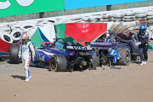 RB's Australian driver Daniel Ricciardo (L) gets out of his car after crashing out with Williams' Thai driver Alexander Albon (R-in car) during the Formula One Japanese Grand Prix race at the Suzuka circuit in Suzuka, Mie prefecture on April 7, 2024. (Photo by JIJI PRESS / AFP) / Japan OUT (Photo by STR/JIJI PRESS/AFP via Getty Images)