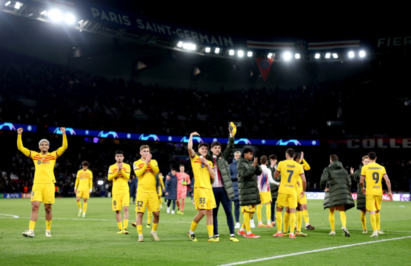 PARIS, FRANCE - APRIL 10: The players of FC Barcelona show appreciation to the fans at full-time following the team's victory in the UEFA Champions League quarter-final first leg match between Paris Saint-Germain and FC Barcelona at Parc des Princes on April 10, 2024 in Paris, France. (Photo by Alex Pantling/Getty Images)