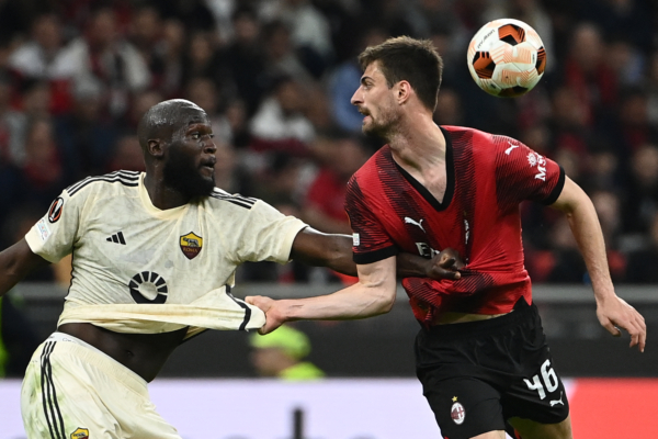 Roma's Belgian midfielder #90 Romelu Lukaku (L) fights for the ball with AC Milan's Italian defender #46 Matteo Gabbia during the UEFA Europa League football match between AC Milan and AS Roma at San Siro Stadium, in Milan on April 11, 2024. (Photo by Isabella BONOTTO / AFP) (Photo by ISABELLA BONOTTO/AFP via Getty Images)