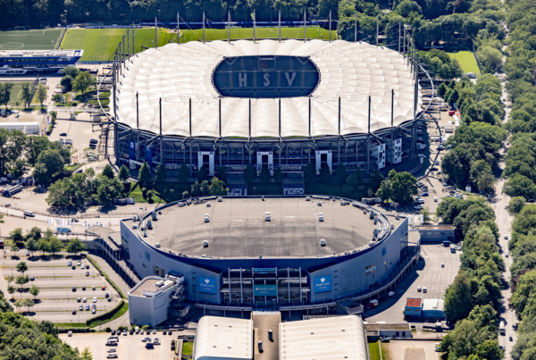 An aerial view shows the 'Volksparkstadion', home stadium of German football club Hamburger SV, taken from a plane on May 14, 2024 in Hamburg, northern Germany. The UEFA EURO 2024 European Football Championship will take place from June 14 to July 14 in ten stadiums around Germany including Hamburgs's 'Volksparkstadion', called the Hamburg Arena during the Euros. (Photo by Axel Heimken / AFP) 