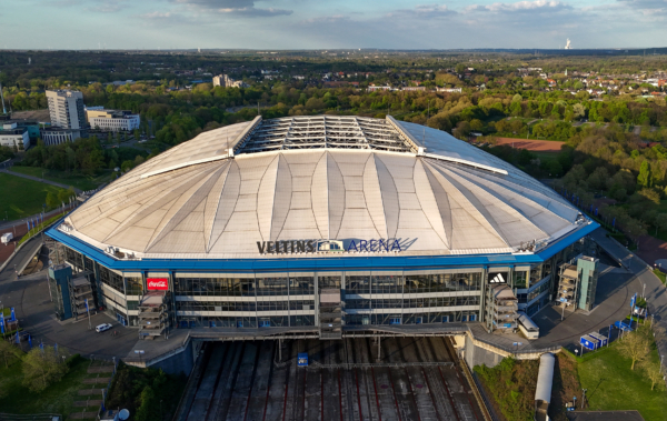 An aerial view taken on April 10, 2024 shows an exterior view of the Veltins Arena in Gelsenkirchen, western Germany. The UEFA EURO 2024 will take place from June 14 to July 14 in ten stadiums in Germany including the Veltins Arena in Gelsenkirchen. (Photo by Ina FASSBENDER / AFP) 