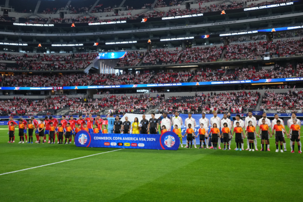 ARLINGTON, TEXAS - JUNE 21: Players of Peru and of Chile line up prior to the CONMEBOL Copa America 2024 Group A match between Peru and Chile at AT&T Stadium on June 21, 2024 in Arlington, Texas. 