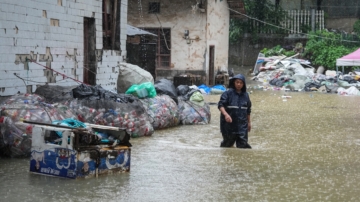 中国南方暴雨成灾 多地水库泄洪 损伤惨重