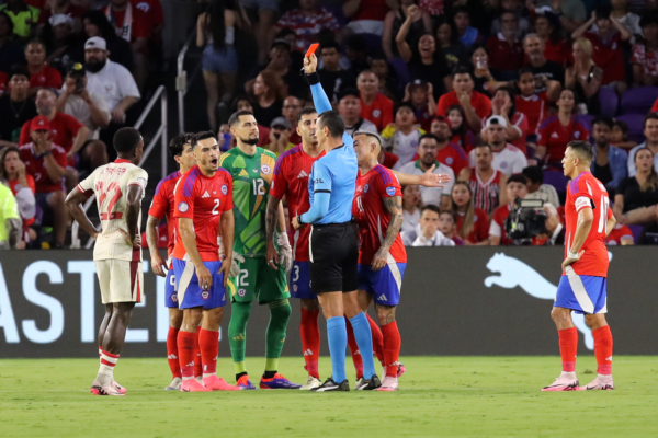 ORLANDO, FLORIDA - JUNE 29: Referee Wilmar Roldan shows a red card to Gabriel Suazo of Chile during the CONMEBOL Copa America 2024 Group A match between Canada and Chile at Exploria Stadium on June 29, 2024 in Orlando, Florida. 