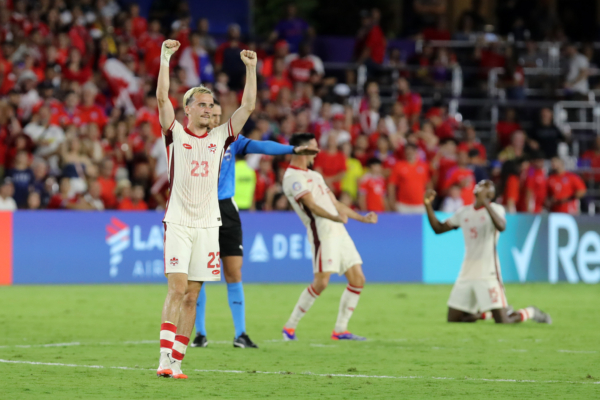 ORLANDO, FLORIDA - JUNE 29: Liam Millar of Canada celebrates the team's progression to the quarter finals after the CONMEBOL Copa America 2024 Group A match between Canada and Chile at Exploria Stadium on June 29, 2024 in Orlando, Florida. 