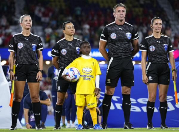 ORLANDO, FLORIDA - JULY 01: Assistant referee Neuza Back, Referee Edina Batista, fourth referee Raphael Claus, Assistant referee Mary Blanco during the CONMEBOL Copa America 2024 Group C match between Bolivia and Panama at Inter&Co Stadium on July 01, 2024 in Orlando, Florida. 