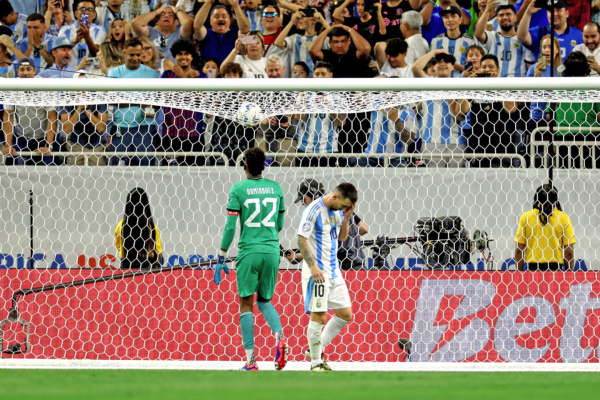 Argentina's forward #10 Lionel Messi gestures after missing a goal from the penalty spot during a penalty shoot out during the Conmebol 2024 Copa America tournament quarter-final football match between Argentina and Ecuador at NRG Stadium in Houston, Texas, on July 4, 2024. (Photo by CHARLY TRIBALLEAU / AFP) 