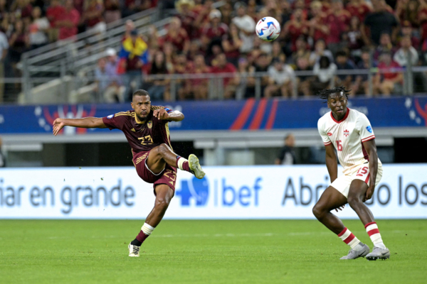 Venezuela's forward #23 Salomon Rondon scores his team's first goal during the Conmebol 2024 Copa America tournament quarter-final football match between Venezuela and Canada at AT&T Stadium in Arlington, Texas, on July 5, 2024. (Photo by JUAN MABROMATA / AFP) 