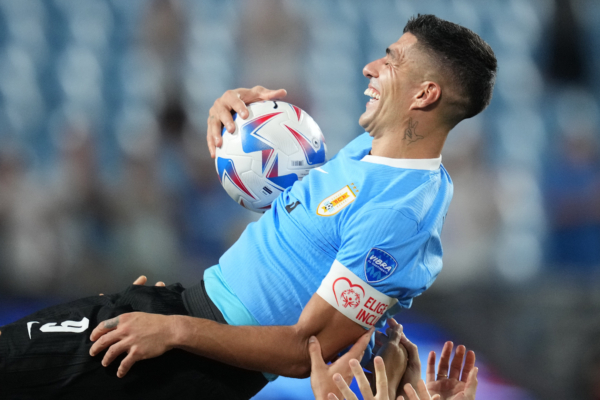 CHARLOTTE, NORTH CAROLINA - JULY 13: Luis Suarez of Uruguay is thrown in the air by teammates after winning the CONMEBOL Copa America 2024 third place match between Uruguay and Canada at Bank of America Stadium on July 13, 2024 in Charlotte, North Carolina. 