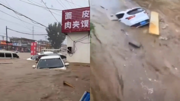 秦皇岛遭强暴雨袭击 市区水深1米 大量汽车被冲走（视频）