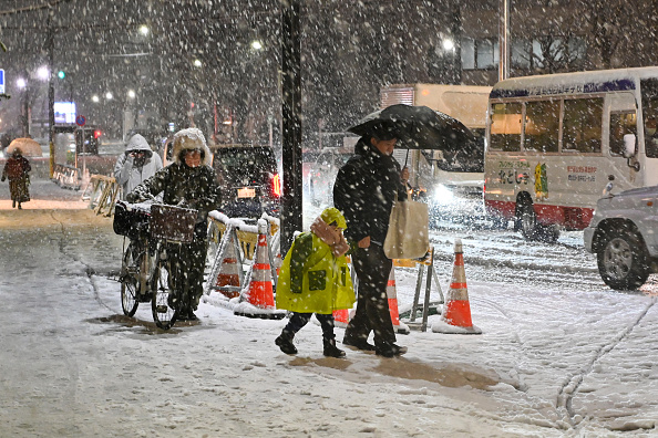 韩国连假降雪阻出程 日本西侧明变天