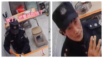 西安疑似穿警服人员饭店放头发 被监控拍下（视频）