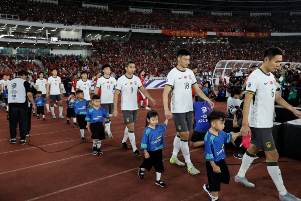 JAKARTA, INDONESIA - JUNE 05: China players enter the pitch prior to the FIFA World Cup qualifier Asian third round Group C match between Indonesia and China at Gelora Bung Karno Stadium on June 05, 2025 in Jakarta, Indonesia. 