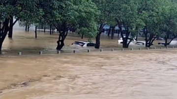 中国南方多省暴雨  泄洪造成洪灾遍野