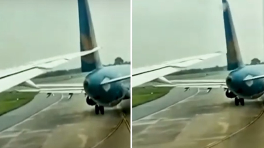 越南航空2客机跑道擦撞 空巴尾翼硬生生被一刀切(视频)