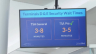 美机场暂停快速通关 超4千万旅客受影响