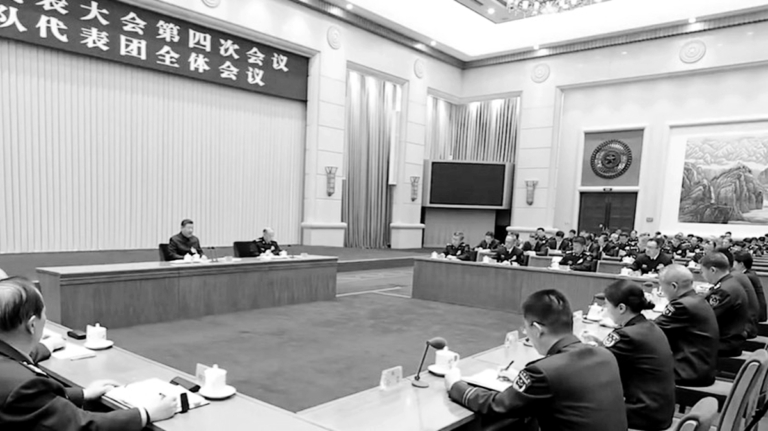 習現身軍方會場氣氛怪異 喊話軍隊不能有「二心」