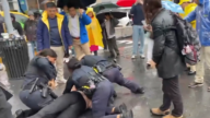 滋擾紐約法輪功集會 鬧事者被警方現場制伏