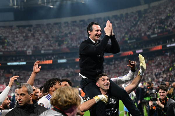 TOPSHOT - Aston Villa's Spanish manager Unai Emery celebrates with his players after winning the UEFA Europa League final football match between SC Freiburg and Aston Villa at Besiktas Park in Istanbul on May 20, 2026.