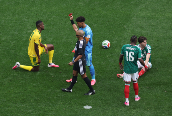 MEXICO CITY, MEXICO - JUNE 11: Referee Wilton Sampaio issues a red card to Sphephelo Sithole #13 of South Africa during the FIFA World Cup 2026 Group A match between Mexico and South Africa at Mexico City Stadium on June 11, 2026 in Mexico City, Mexico.