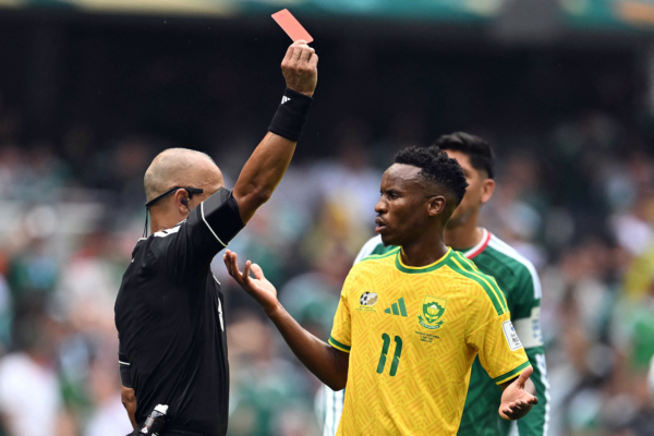Brazilian referee Wilton Sampaio shows a red card to South Africa's midfielder #11 Themba Zwane during the 2026 World Cup Group A football match between Mexico and South Africa at the Mexico City Stadium in Mexico City on June 11, 2026.