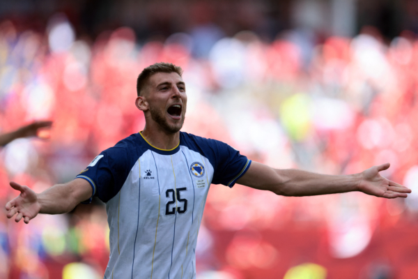 Bosnia-Herzegovina's forward #25 Jovo Lukic celebrates after scoring a goal during the 2026 World Cup Group B football match between Canada and Bosnia and Herzegovina at the Toronto Stadium in Toronto on June 12, 2026.