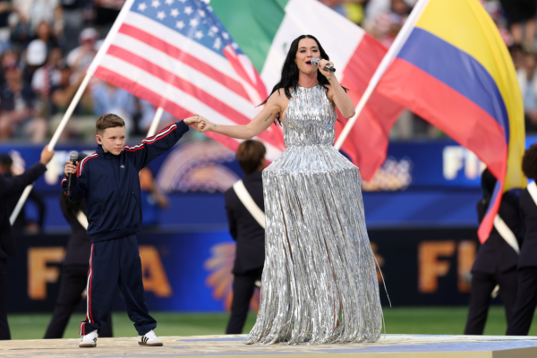 LOS ANGELES, CALIFORNIA - JUNE 12: Katy Perry performs with Tius Luka during the Parade of Nations before the FIFA World Cup 2026 Group D match between USA and Paraguay at Los Angeles Stadium on June 12, 2026 in Los Angeles, California.