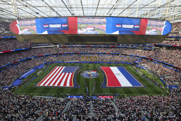 LOS ANGELES, CALIFORNIA - JUNE 12: General view inside the stadium as players of both side's line up prior to the FIFA World Cup 2026 Group D match between USA and Paraguay at Los Angeles Stadium on June 12, 2026 in Los Angeles, California.