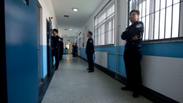 报告揭中共看守所黑幕 七成遭暴力 会面律师难