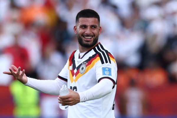 Germany's forward #26 Deniz Undav celebrates his team's victory at the end of the 2026 World Cup Group E football match between Germany and Ivory Coast at the Toronto Stadium in Toronto on June 20, 2026. (Photo by Cole Burston / AFP)