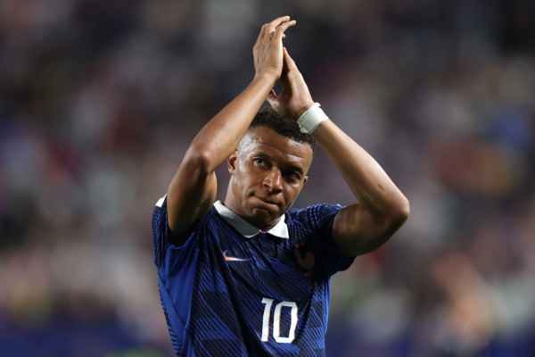 PHILADELPHIA, PENNSYLVANIA - JUNE 22: Kylian Mbappe #10 of France applauds fans as he walks off the pitch after being substituted during the FIFA World Cup 2026 Group I match between France and Iraq at Philadelphia Stadium on June 22, 2026 in Philadelphia, Pennsylvania.