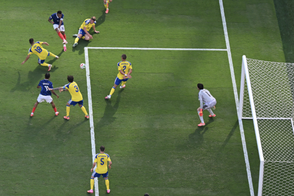 France's forward #10 Kylian Mbappe shoots to score his team's first goal during the 2026 World Cup round of 32 football match between France and Sweden at the New York/New Jersey Stadium in East Rutherford on June 30, 2026.