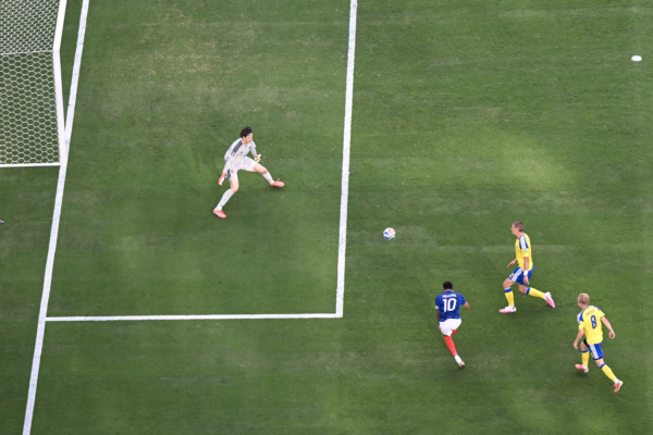 France's forward #10 Kylian Mbappe scores his team's third goal during the 2026 World Cup round of 32 football match between France and Sweden at the New York/New Jersey Stadium in East Rutherford on June 30, 2026.