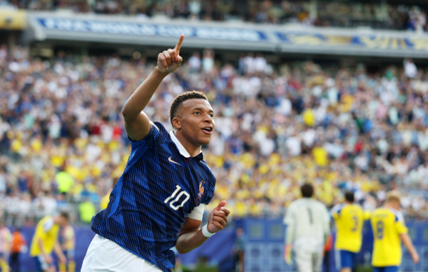 EAST RUTHERFORD, NEW JERSEY - JUNE 30: Kylian Mbappe #10 of France celebrates scoring his team's third goal during the FIFA World Cup 2026 Round Of 32 match between France and Sweden at New York New Jersey Stadium on June 30, 2026 in East Rutherford, New Jersey.