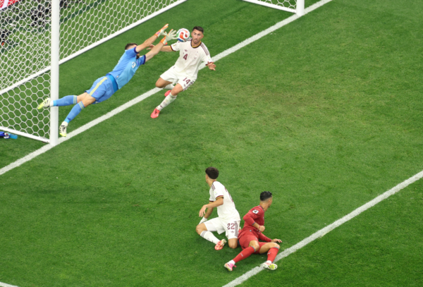 ARLINGTON, TEXAS - JULY 06: Unai Simon #23 of Spain makes a save against Cristiano Ronaldo #7 of Portugal during the FIFA World Cup 2026 Round of 16 match between Portugal and Spain at Dallas Stadium on July 06, 2026 in Arlington, Texas.