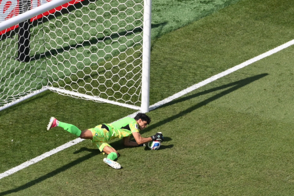 Morocco's goalkeeper #01 Yassine Bounou saves a penalty kick by France's forward #10 Kylian Mbappe during the 2026 World Cup football tournament quarter-final match between France and Morocco at Boston Stadium in Foxborough on July 9, 2026.