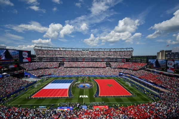 French and Moroccan flags are unfurled on the pitch as players arrive for the 2026 World Cup football tournament quarter-final match between France and Morocco at Boston Stadium in Foxborough on July 9, 2026.