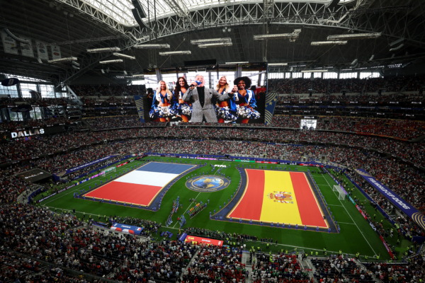 ARLINGTON, TEXAS - JULY 14: Players and match officials line up before the FIFA World Cup 2026 Semi Final match between France and Spain at Dallas Stadium on July 14, 2026 in Arlington, Texas.