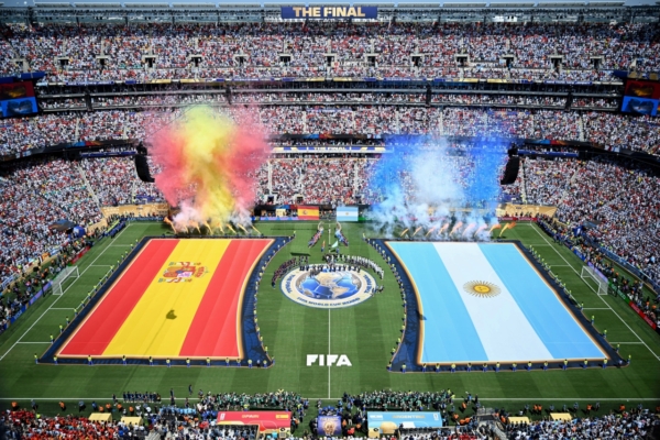 The Spanish and Argentine flags are displayed on the pitch ahead of the 2026 World Cup football tournament final match between Spain and Argentina at the New York/New Jersey Stadium in East Rutherford on July 19, 2026. (Photo by MAURO PIMENTEL / AFP)