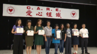 华人爱心组织为Neff小学送书包 新学期好开端