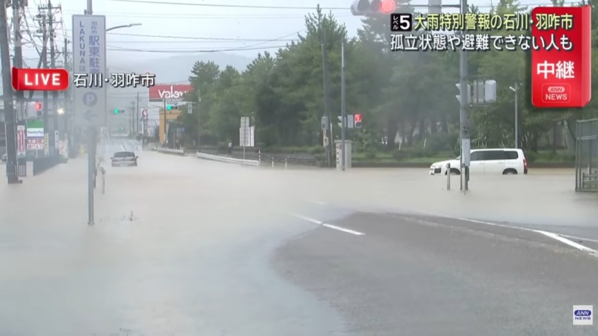 日本石川、富山豪雨警报降为3级 冰见市民众：水淹及胸
