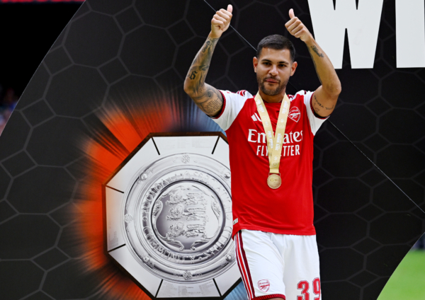 CARDIFF, WALES - AUGUST 16: Bruno Guimaraes of Arsenal shows a thumbs up after receiving his winner's medal following his team's victory in the 2026 FA Community Shield match between Arsenal and Manchester City at Principality Stadium on August 16, 2026 in Cardiff, Wales.