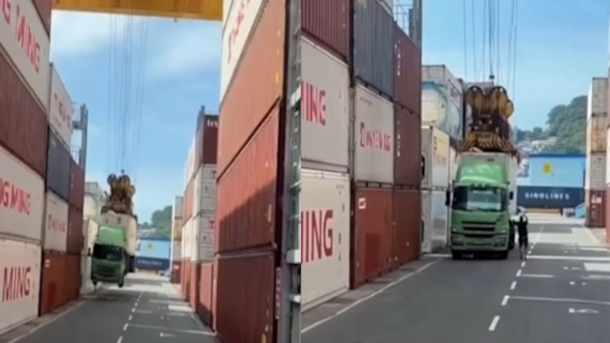 基隆港货柜车司机忘拔插销 起重机连柜带人车吊起