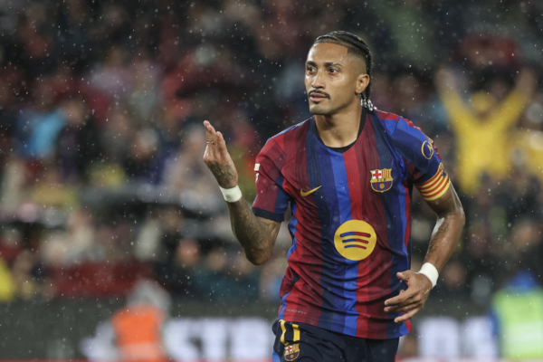 Barcelona's Brazilian forward #11 Raphinha celebrates scoring his team's fifth goal and a hat-trick during the Spanish league football match between FC Barcelona and Racing Santander at the Camp Nou stadium in Barcelona on September 16, 2026. 
